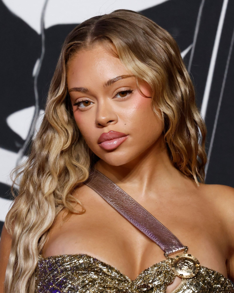 Closeup shot of Latto with cinnamon toast hair